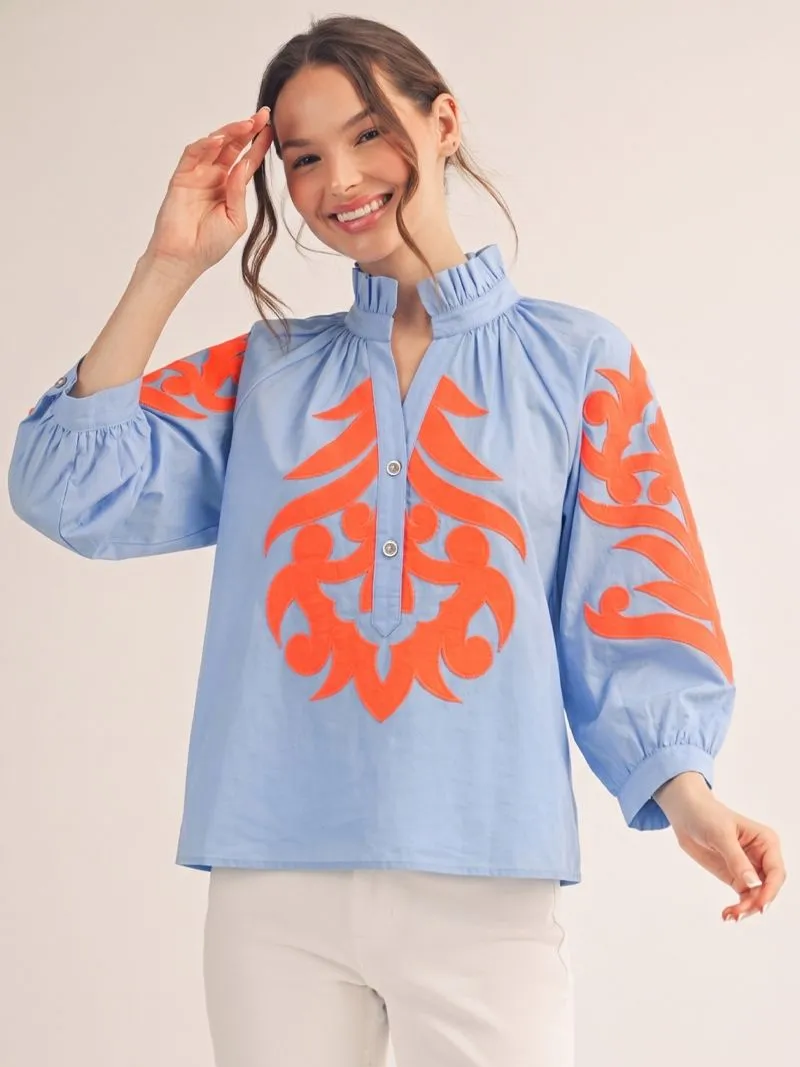 Light Blue Blouse with Orange Appliqué